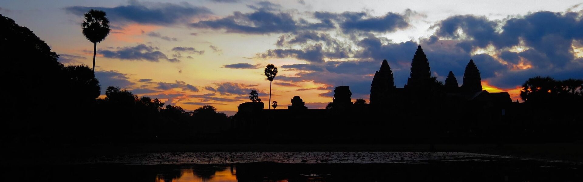 Witness the iconic temple bathed in golden morning light