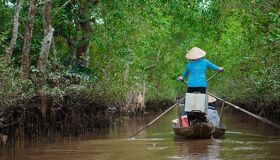 Panoramic view of Can Tho’s delta canals for a scenic Can Tho Tours banner by Legend Travel Group.