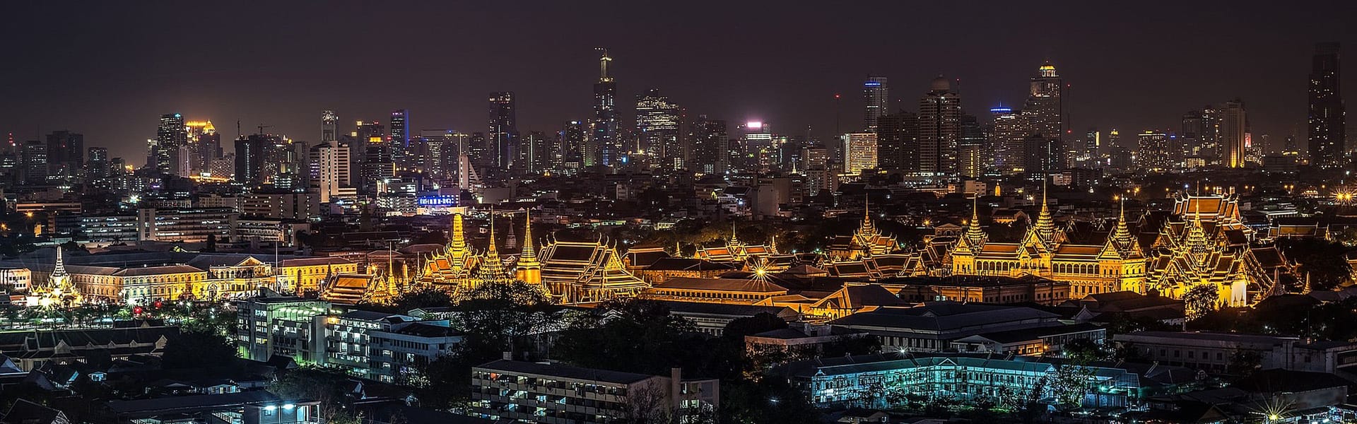 Iconic Bangkok cityscape at dusk for a Bangkok Tours banner by Legend Travel Group.