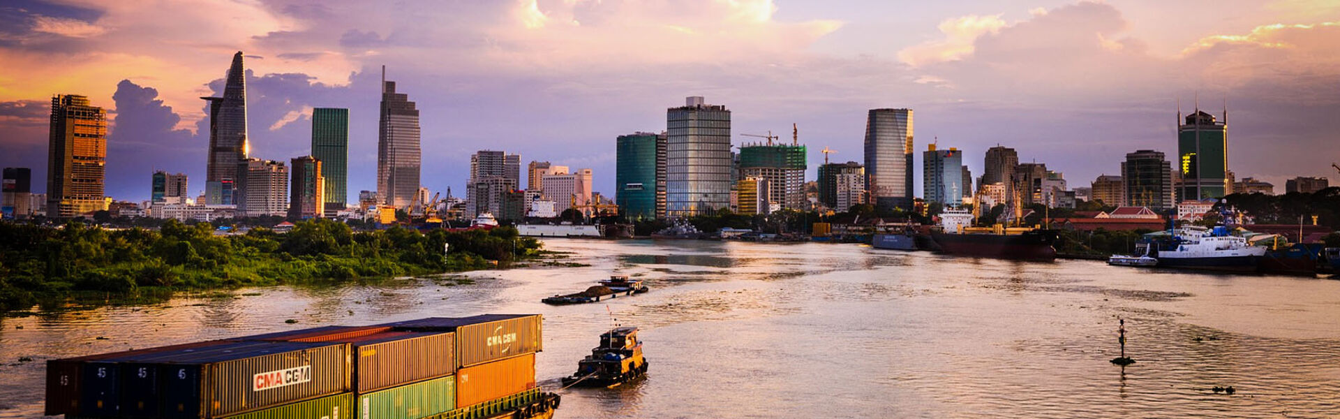 Serene Ho Chi Minh City Saigon River on a Ho Chi Minh City Tours banner by Legend Travel Group.