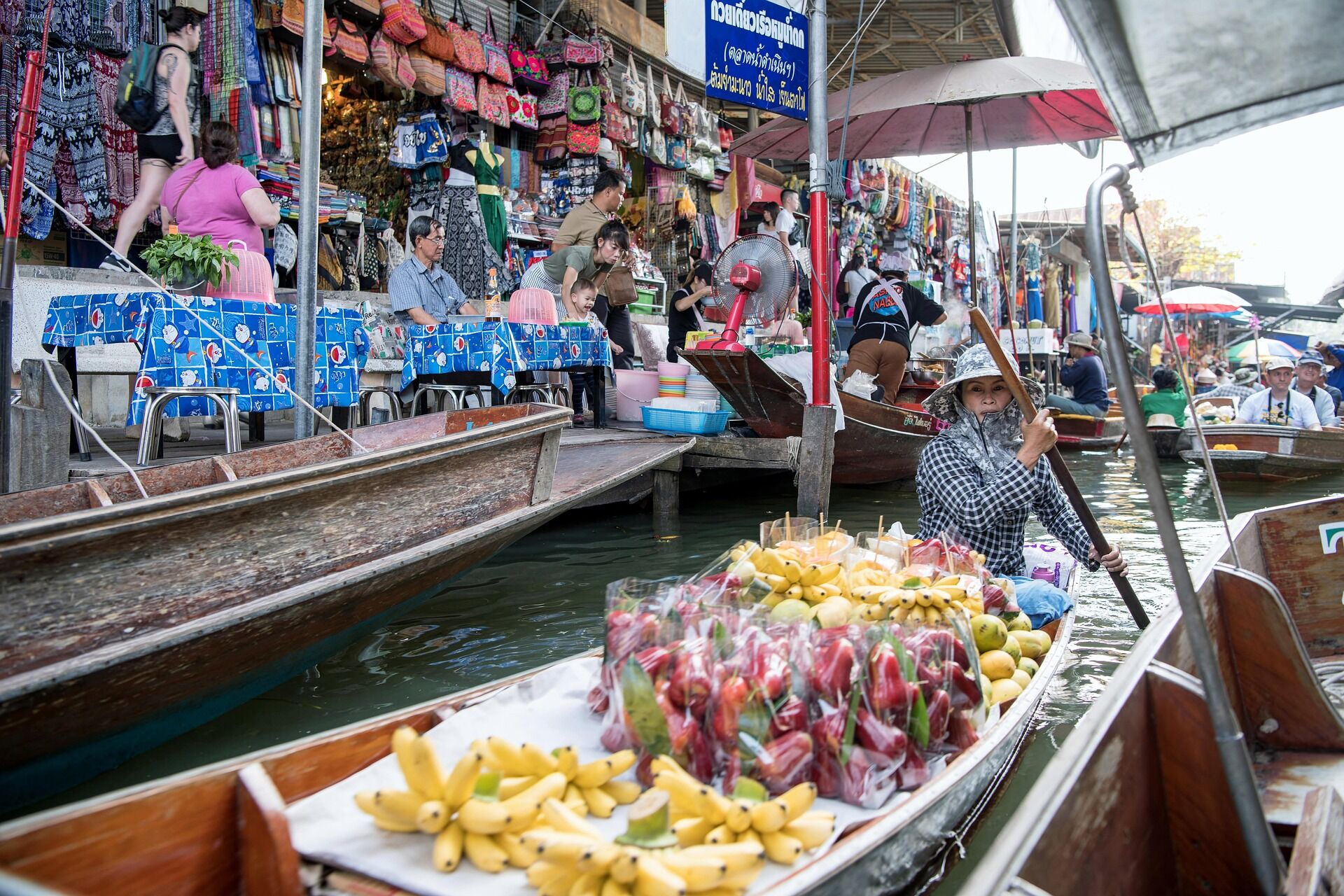 Capture the authentic charm of Thai riverside life