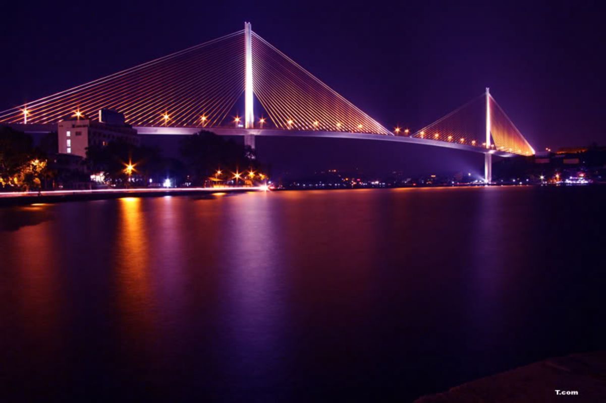 Marvel at Halong’s cable-stayed bridge on a night tour
