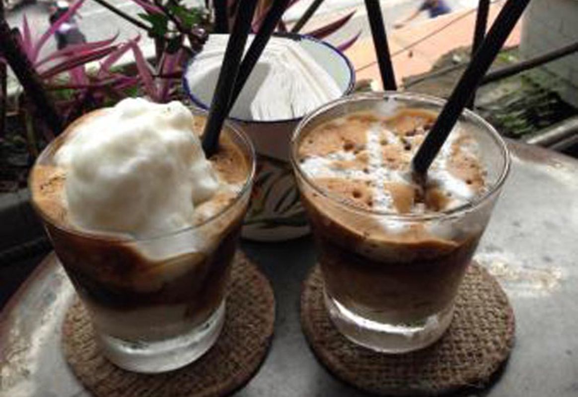 Capture the tropical essence of Hanoi’s coffee gem
