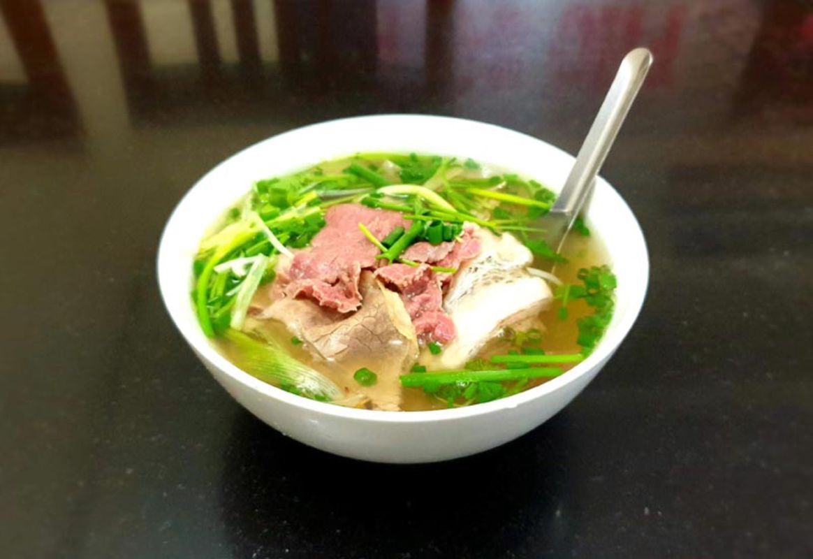 Capture the savory essence of Hanoi’s culinary gem