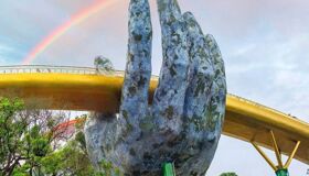 Iconic hands holding Vietnam’s famous bridge