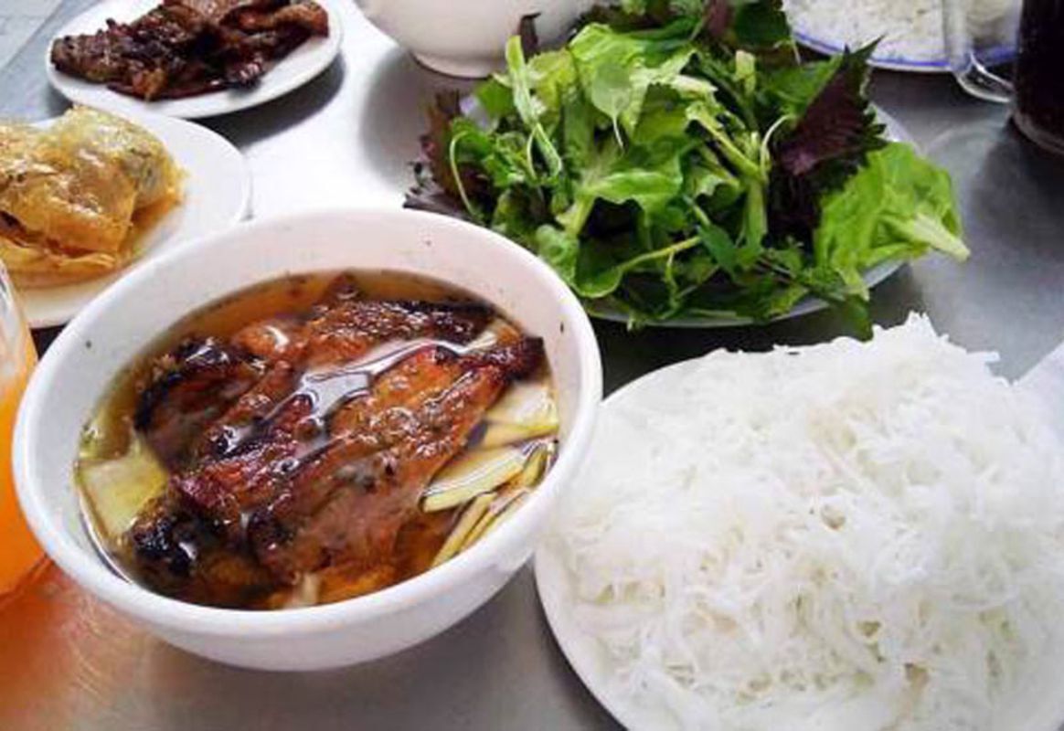 Savor savory flavors with friends on a Hanoi food tour