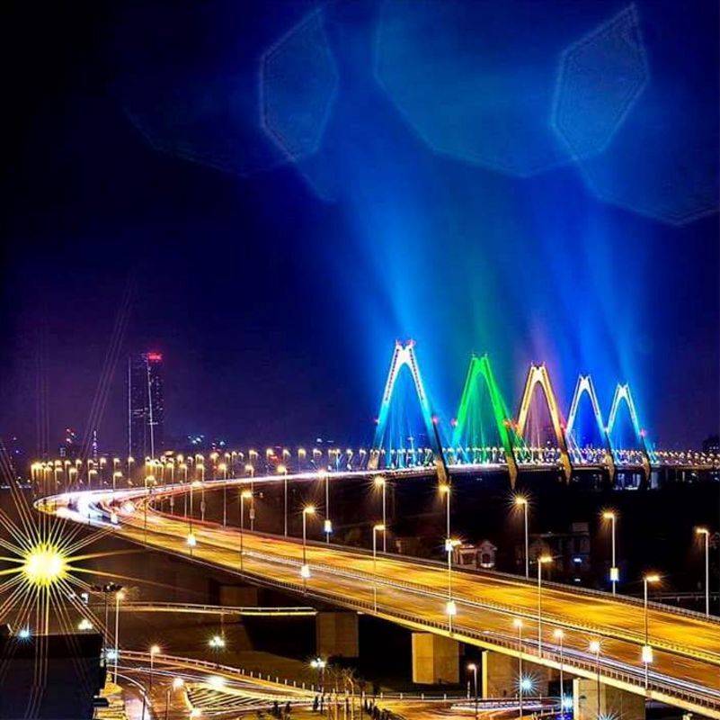 Capture the bridge’s vibrant glow for stunning photos