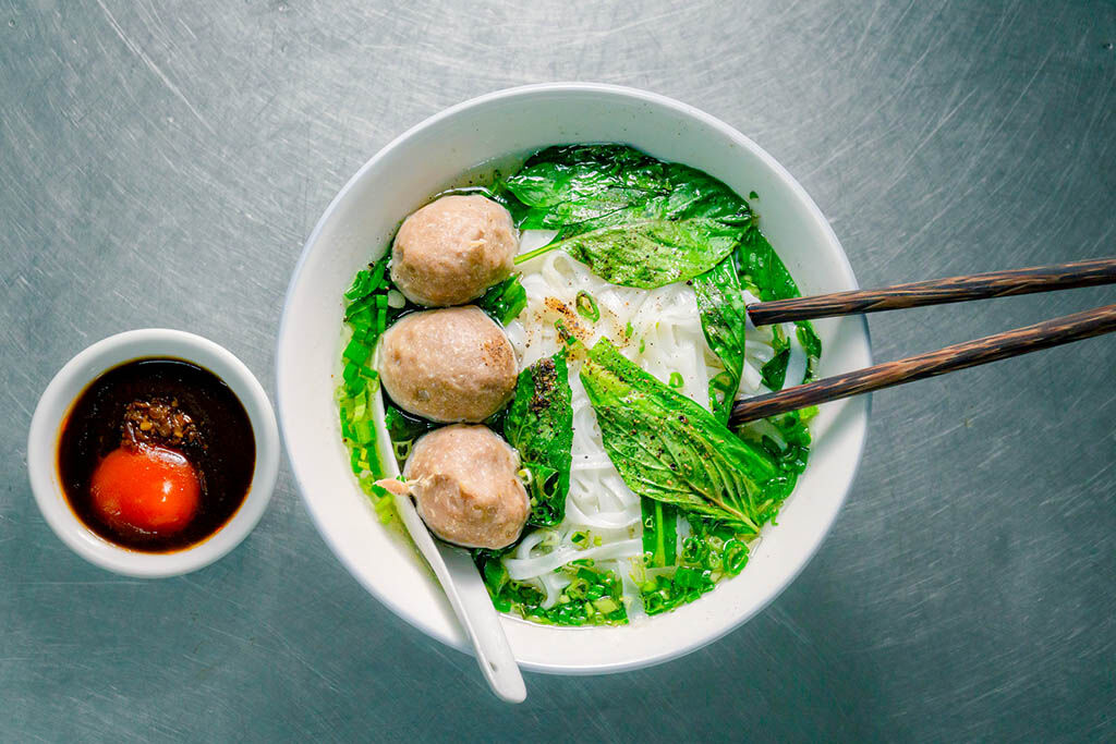 Savor authentic Vietnamese pho from a local vendor
