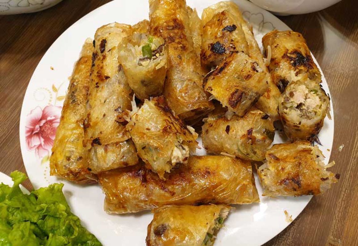 Capture the savory essence of Hanoi’s street food gem