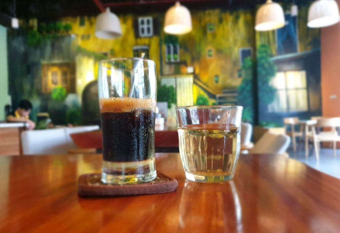 Capture the bold flavors of Hanoi’s Old Quarter’s coffee gem
