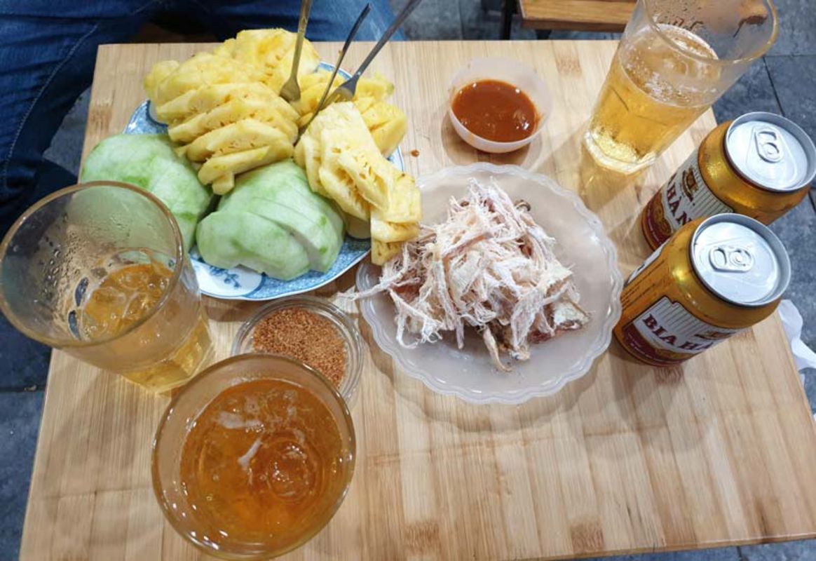 Join the lively bia hoi toasts in Hanoi’s Old Quarter