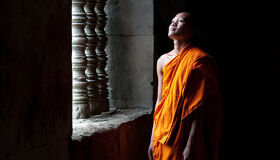Buddhist Monk at the window of the temple, Siem Reap
