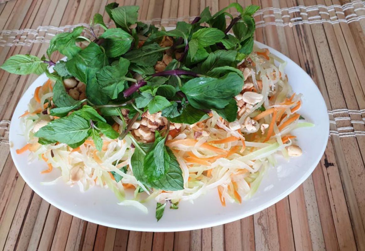 Capture the tangy flavors of Hanoi’s street food jewel