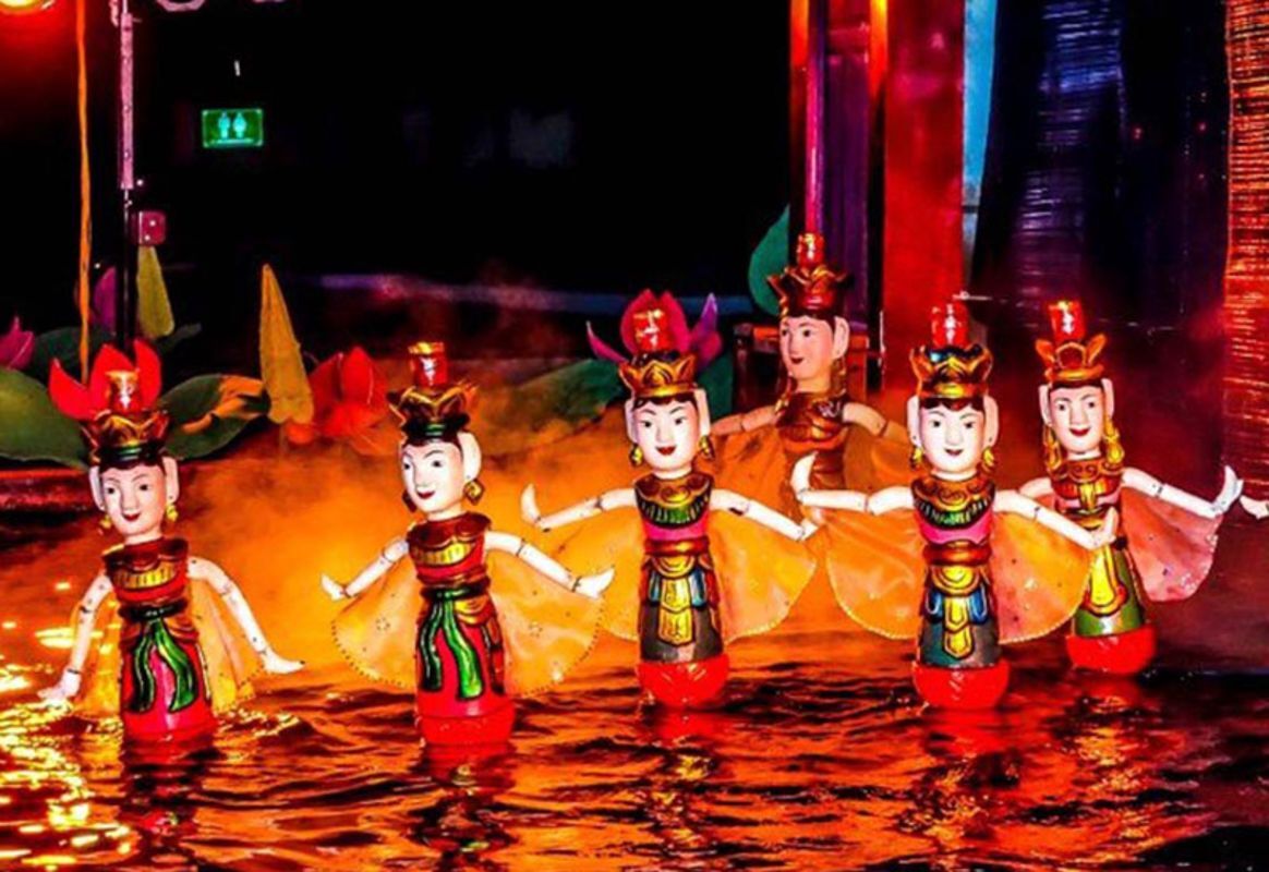 Watching Water Puppet Show in Thang Long Water Puppet Theatre
