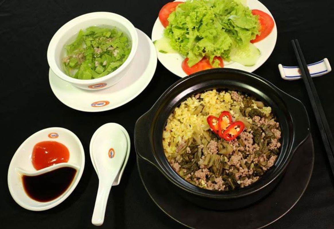 Capture the savory essence of Hanoi’s street food gem