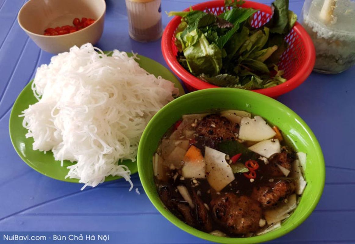 Dive into the vibrant flavors of Bún Chả Sinh Từ Travel