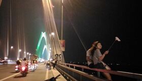 Explore Hanoi’s iconic bridge on an eco-friendly bike tour