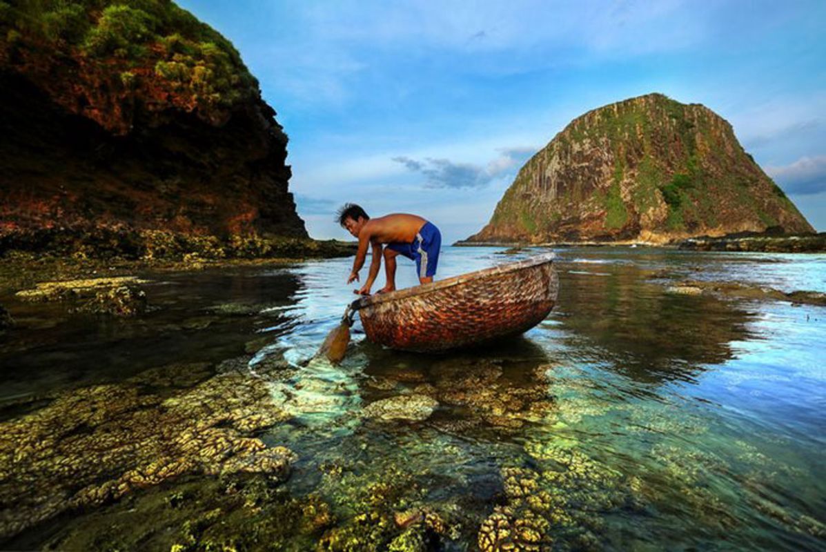 Capture the dramatic beauty of Yen Islet’s coastal gem