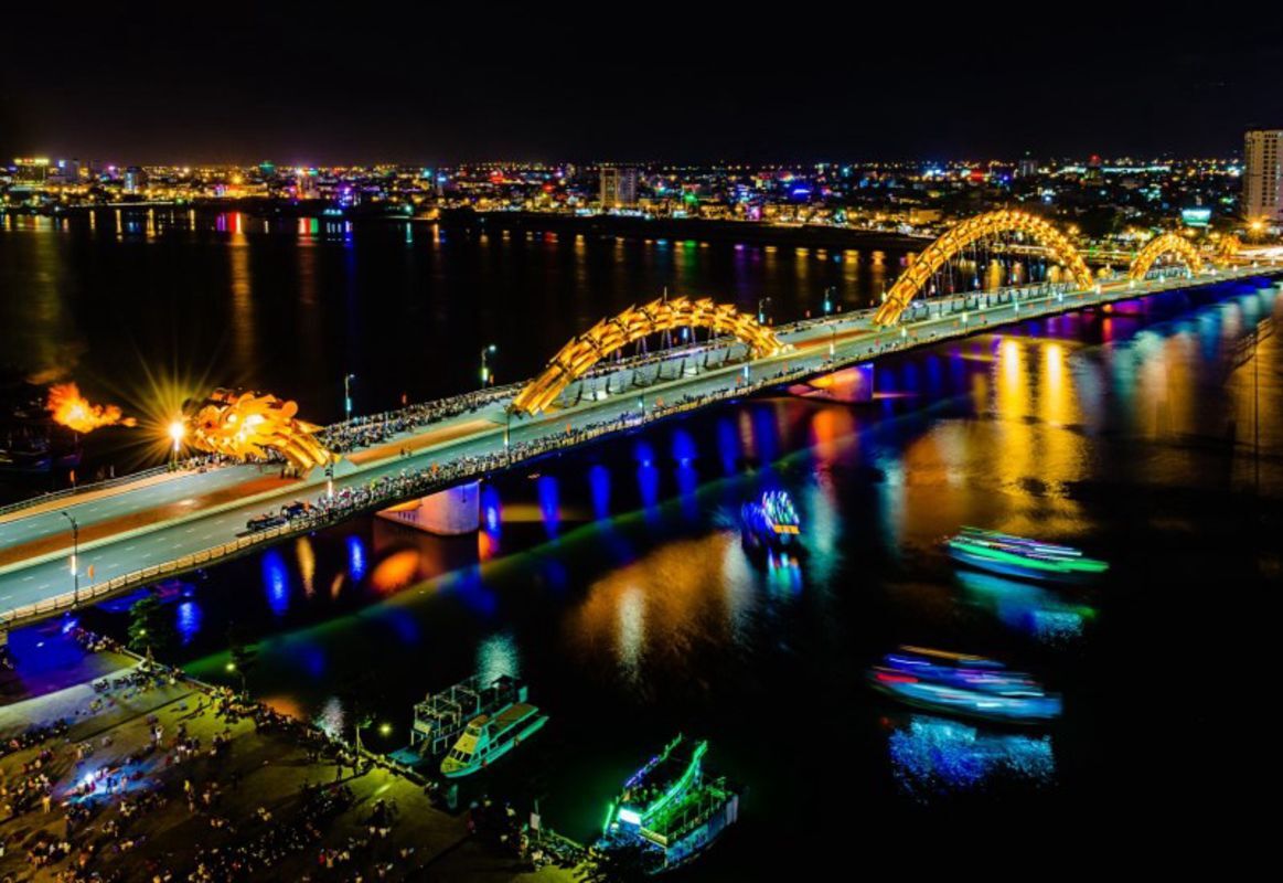 Capture the vibrant beauty of Dragon Bridge’s iconic design