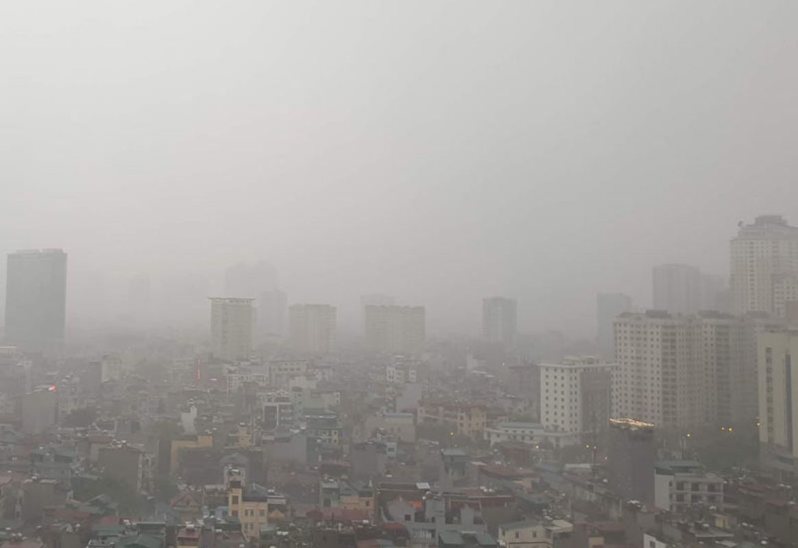 Capture the cultural essence of Hanoi’s rainy day gem