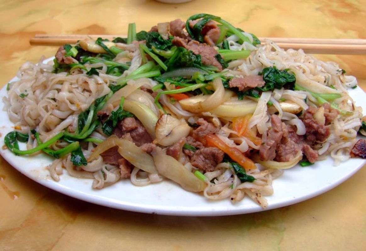 Photograph the savory allure of Old Quarter’s street food