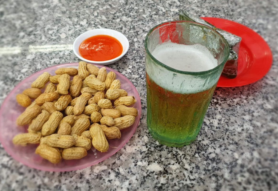 Photograph the communal allure of Hanoi's street scene