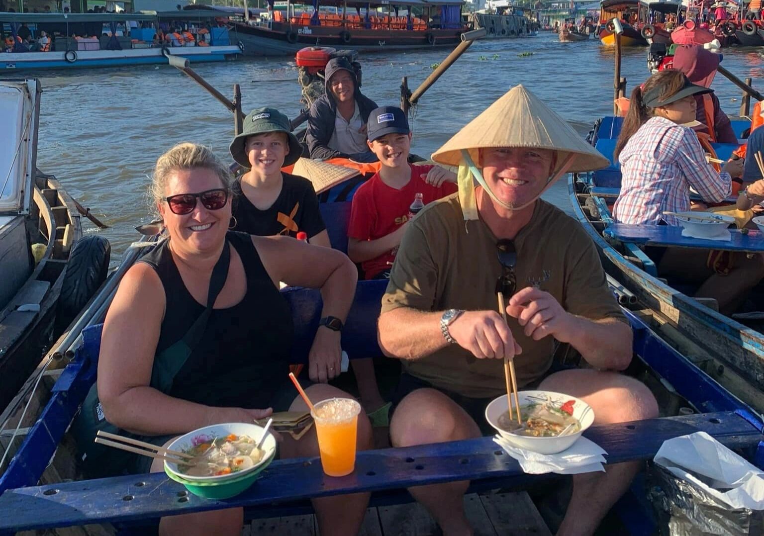 Discover colorful river life on a Mekong Delta boat tour
