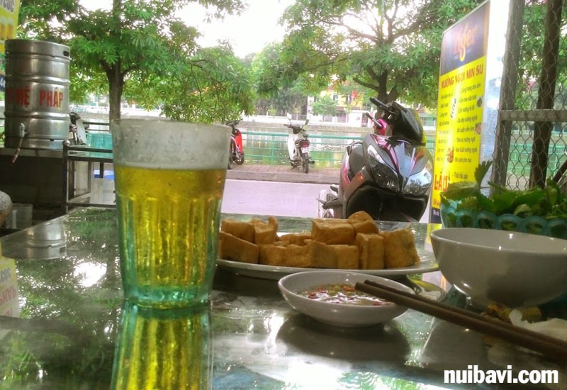 Capture the vibrant essence of Hanoi's beer culture