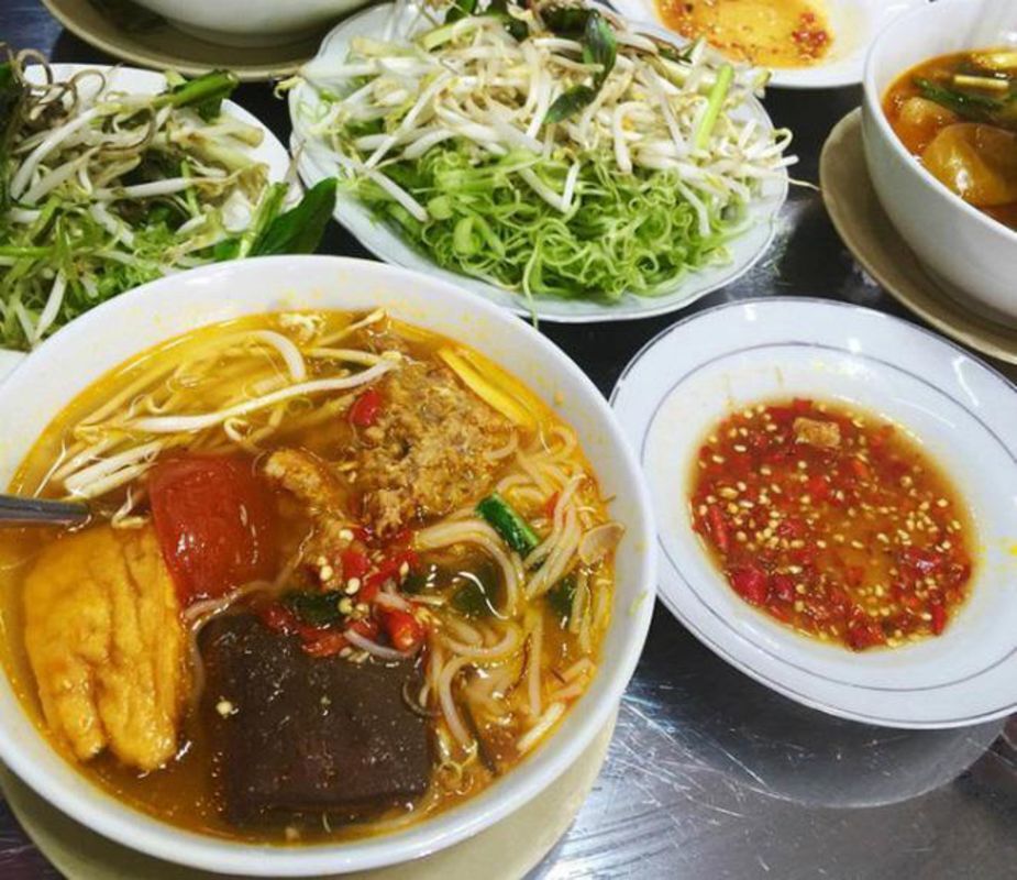 Capture the savory essence of Ben Thanh Market’s culinary gem