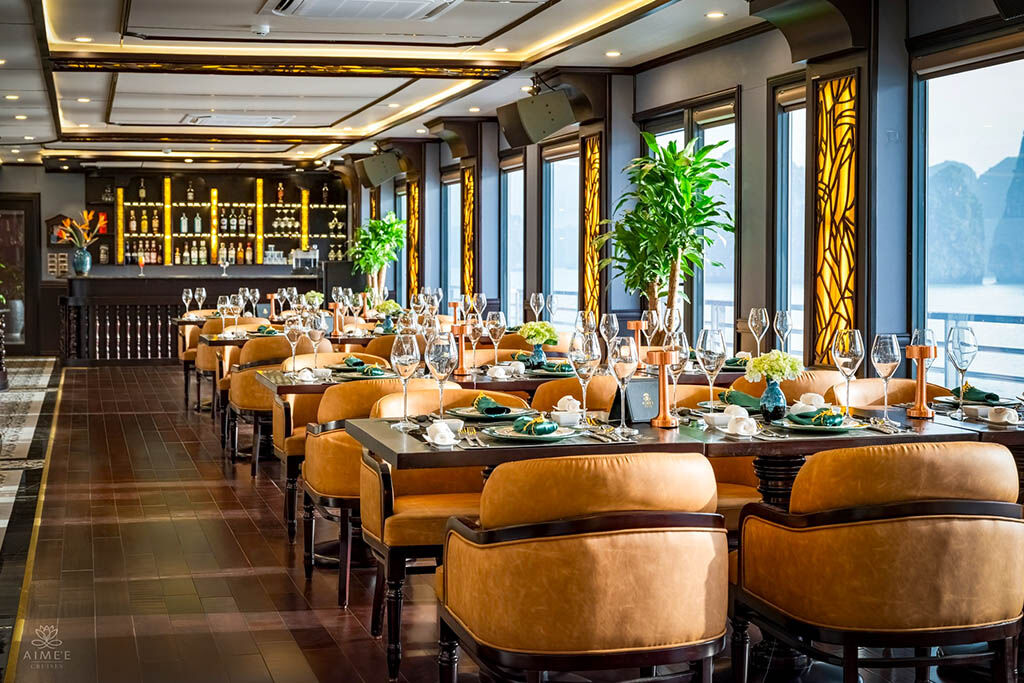 Savor gourmet dining while anchored among Halong Bay’s islands