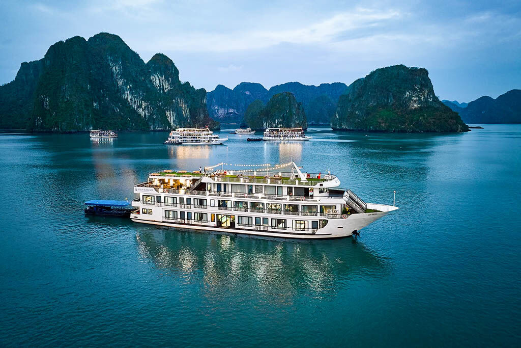 Awaken to Halong Bay’s golden glow