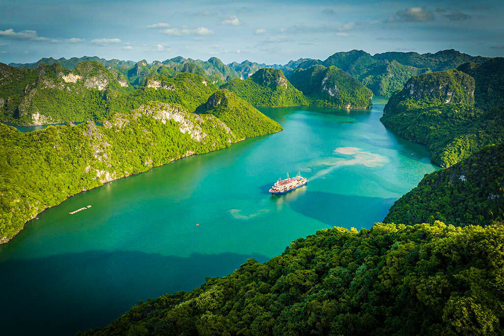 Capture the serene beauty of Lan Ha Bay’s limestone karsts