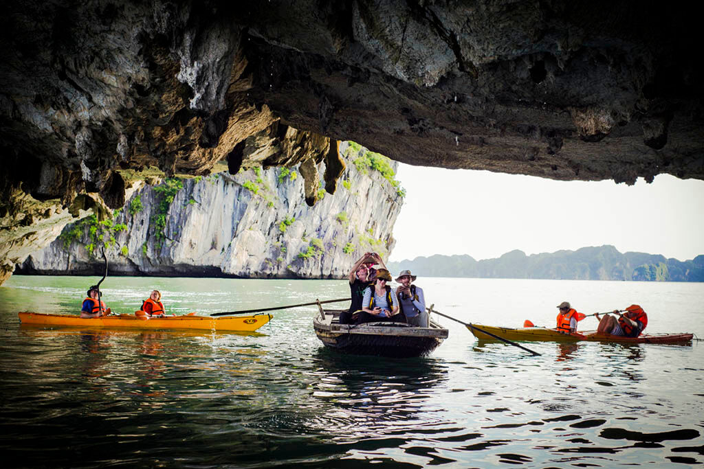 Enjoy a close-up view of Halong Bay’s majestic limestone formations