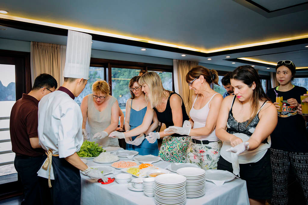 Join a hands-on Vietnamese cooking class onboard your cruise