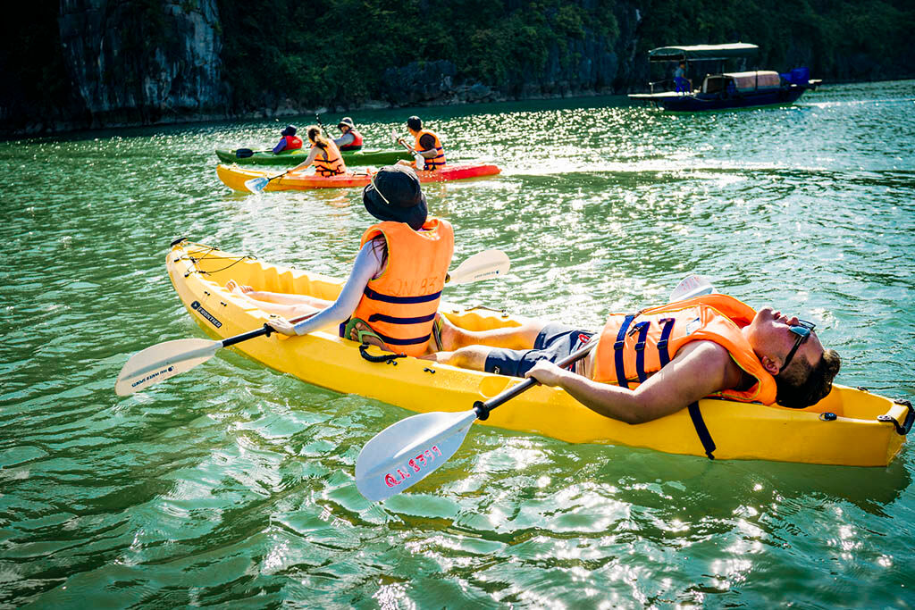 Experience freedom on the water through kayaking and swimming adventures