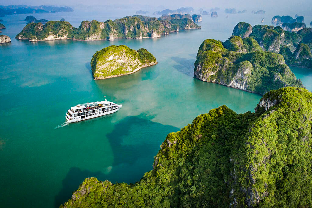 Wake up to panoramic bay views from your elegant cabin aboard