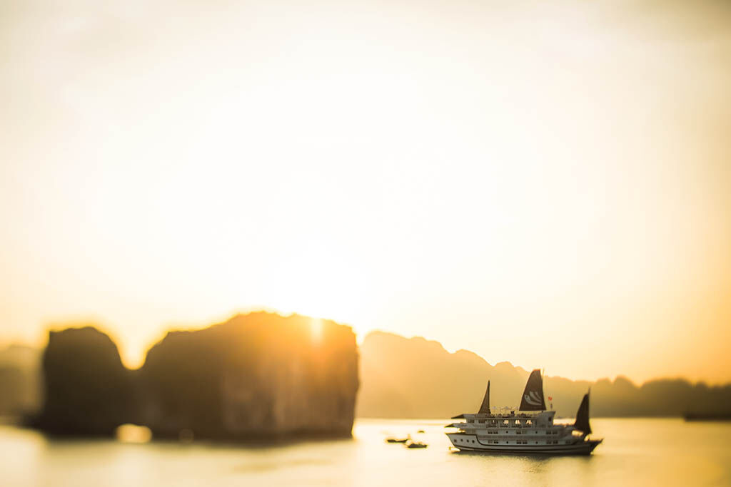 Awaken to sunrise over Halong Bay’s majestic karsts