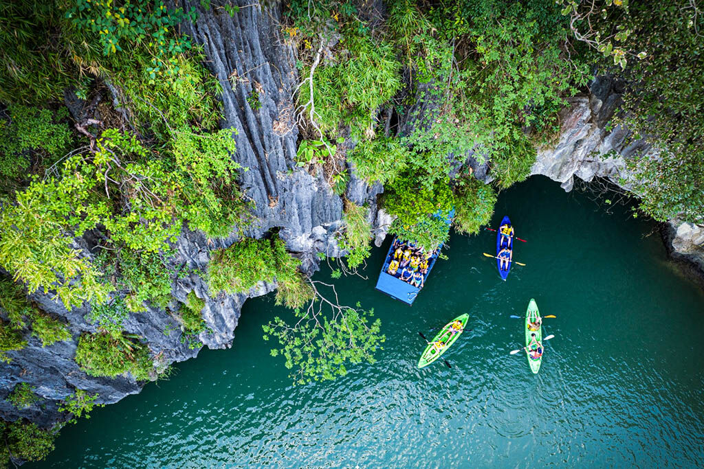 Experience serenity as you sail through Halong Bay’s limestone wonders