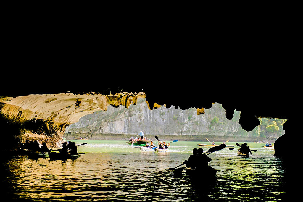 Sail through Vietnam’s iconic limestone karsts at sunrise