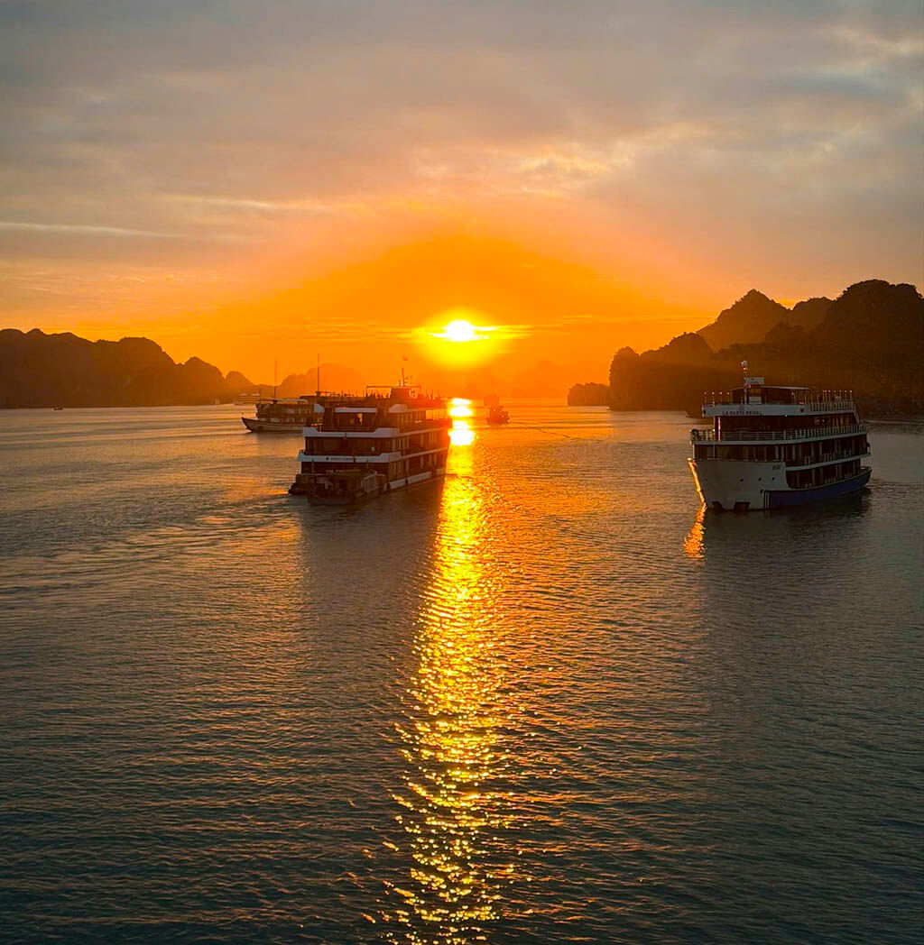 Witness Halong Bay’s magic unfold from dawn to dusk