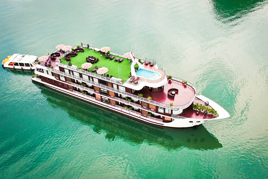 Relax in style above emerald waters