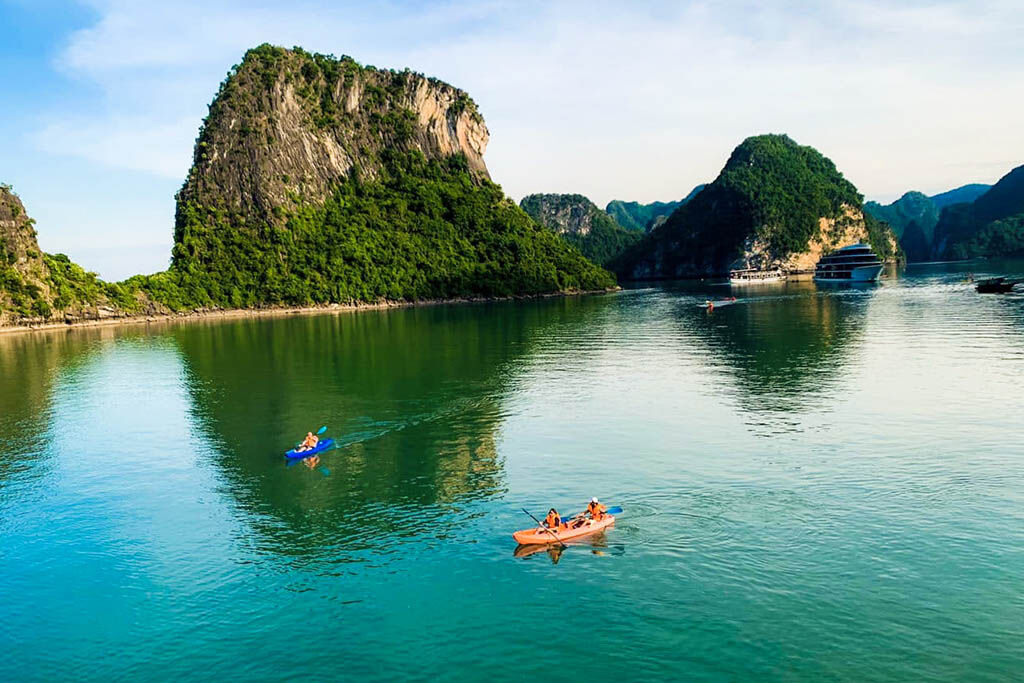 Paddle through emerald waters on your Halong Bay adventure