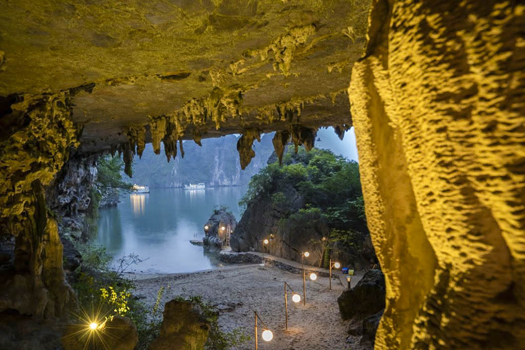 Explore mystical caves in serene Halong Bay