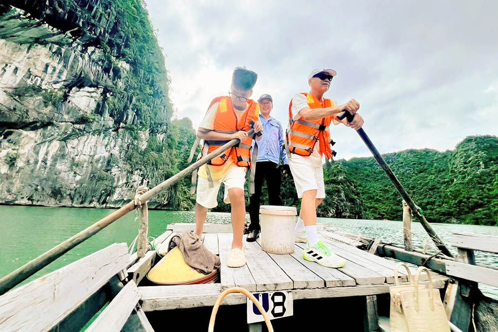 Glide through caves on Halong Bay Tours