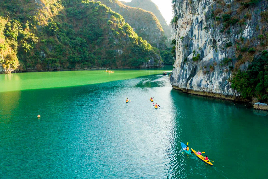 Paddle through emerald waters on your Halong adventure