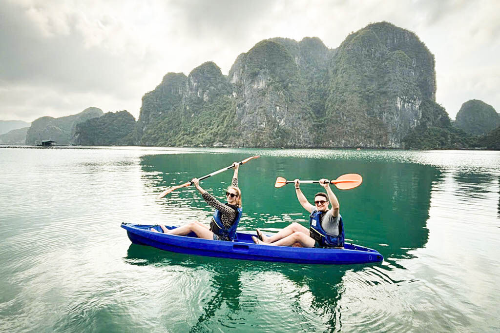 Glide between peach-shaped islets in Lan Ha Bay