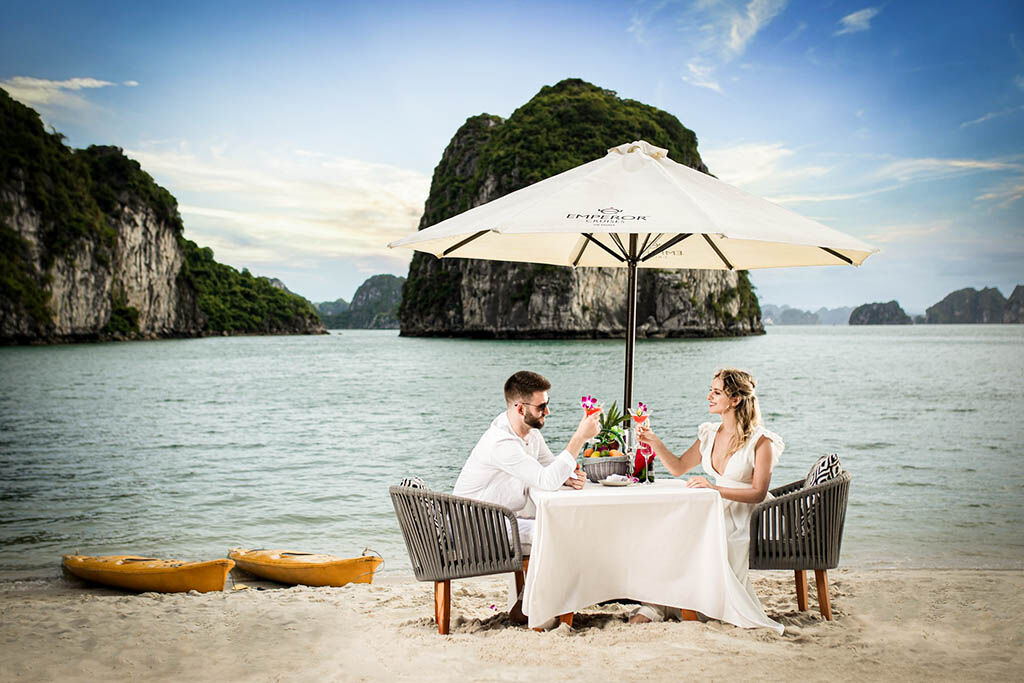 Sail through Vietnam’s iconic limestone karsts at sunrise