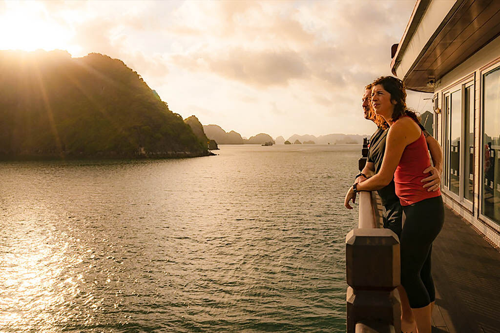 Share timeless moments beneath Halong’s crimson sunsets