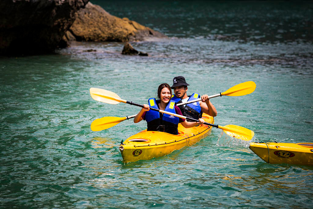 Sail through Vietnam’s iconic limestone karsts at sunrise