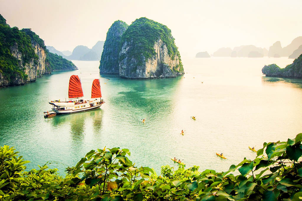Sail through Vietnam’s UNESCO wonder at sunrise